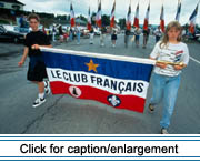 Participants in the annual Acadian Festival parade carry a banner for the Club Franais, a non-profit regional organization dedicated to the preservation of Franch language in the St. John Valley.