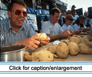 Saint John Valley Times editor Don Levesque competes at the potato-peeling contest at the 1995 Acadian Festival in Madawaska.