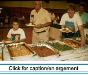 Pot-en-pot, fougére and baked beans are just a few of the local delicacies served to participants at the 1995 Chassé Family Reunion in Madawaska.