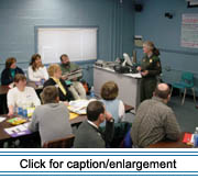 National Park Service ranger Meg Scheid talks to Valley teachers about the St. Croix International Historic Site at a 2004 professional development workshop in the Madawaska Middle/High school.